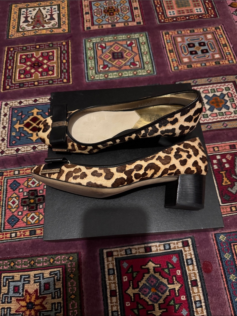 MICHAEL Michael Kors Leopard Print Pony Hair Pumps with Black Bow Accent